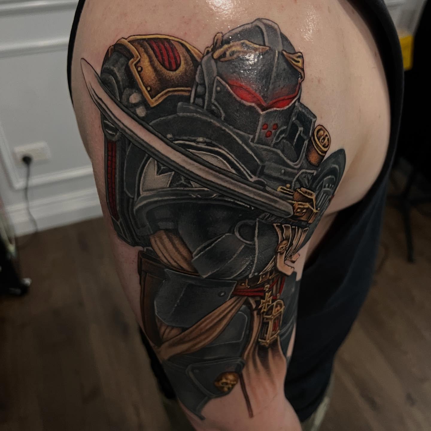 Colour Warhammer 40,000 Space Marine tattoo holding a sword by Independence Ink.