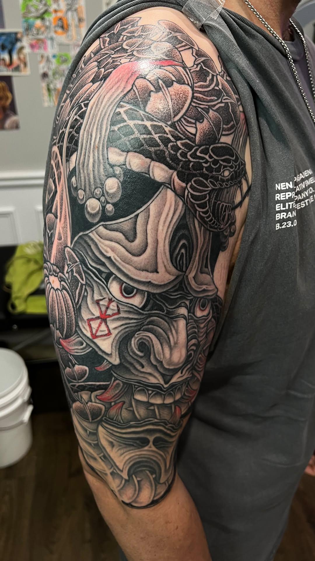Large black and grey Hannya tattoo work by Independence Ink.